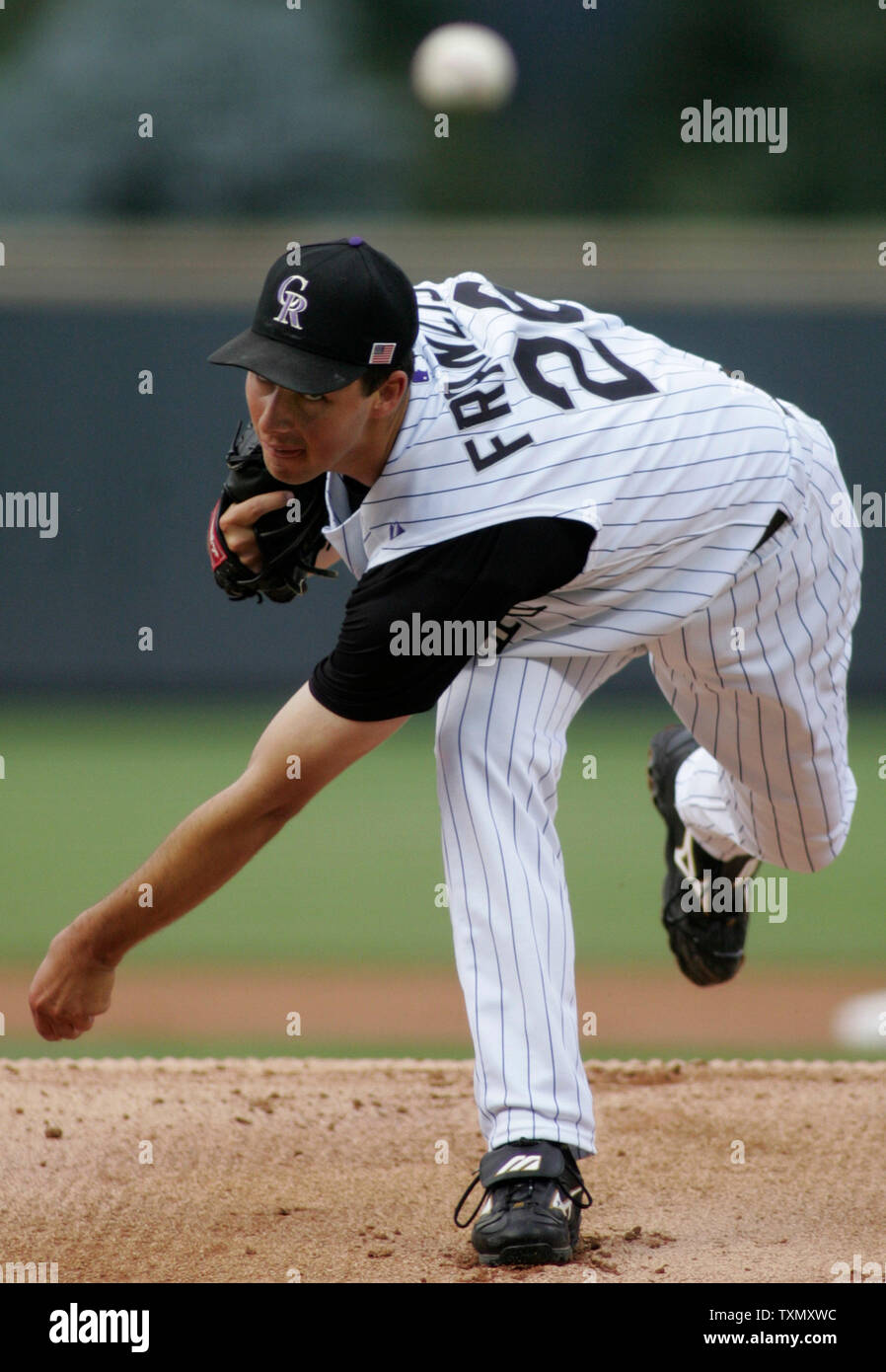 Marlins feast on Rockies' pitching in 10-2 rout at Coors Field