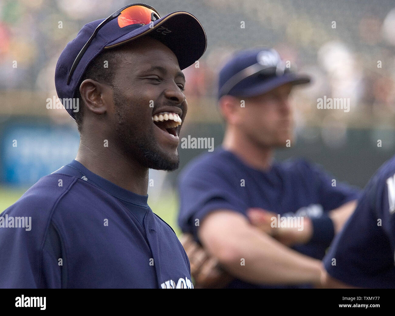 Milwaukee Brewers Tony Gwynn (L), son of San Diego Padres great Tony Gwynn, laughs with teammates prior to game against the Colorado Rockies at Coors Field in Denver, Colorado July 31, 2006.    (UPI Photo/Gary C. Caskey) Stock Photo