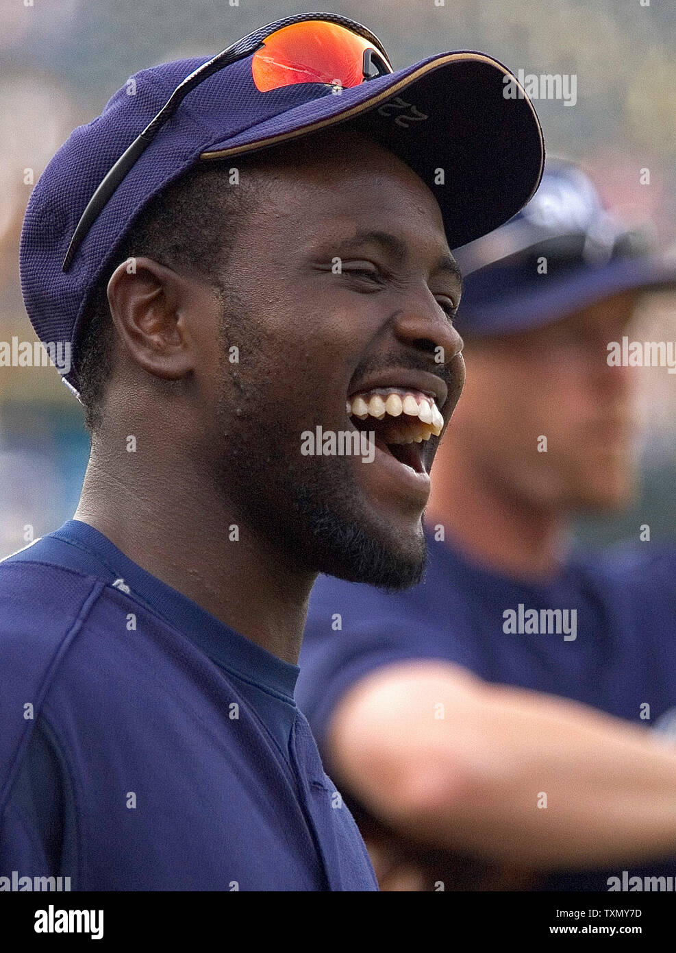 Milwaukee Brewers Tony Gwynn, son of San Diego Padres great Tony Gwynn, enjoys a laugh with teammates prior to game against the Colorado Rockies at Coors Field in Denver, Colorado July 31, 2006.    (UPI Photo/Gary C. Caskey) Stock Photo