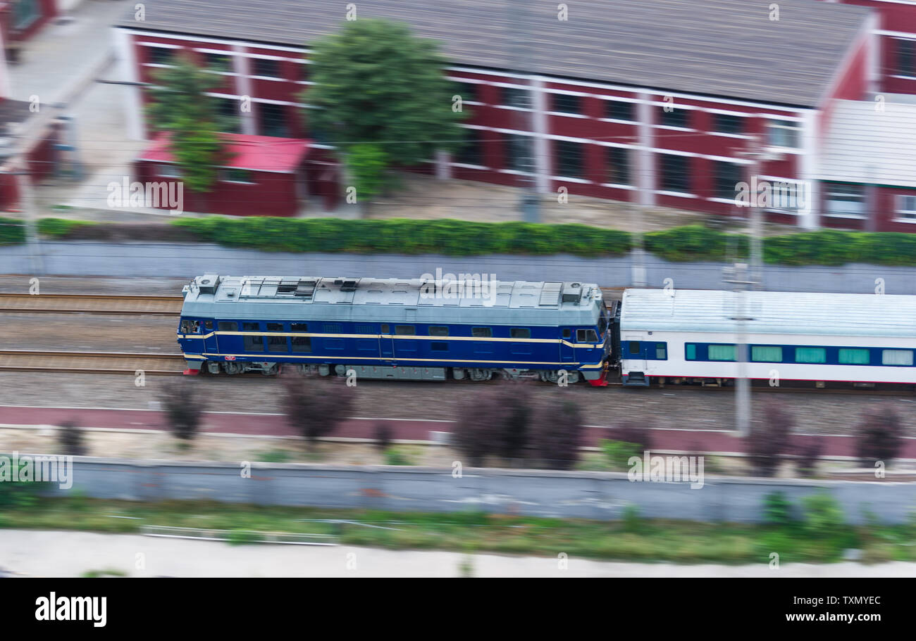 A high-speed internal combustion engine train on a railway. Stock Photo