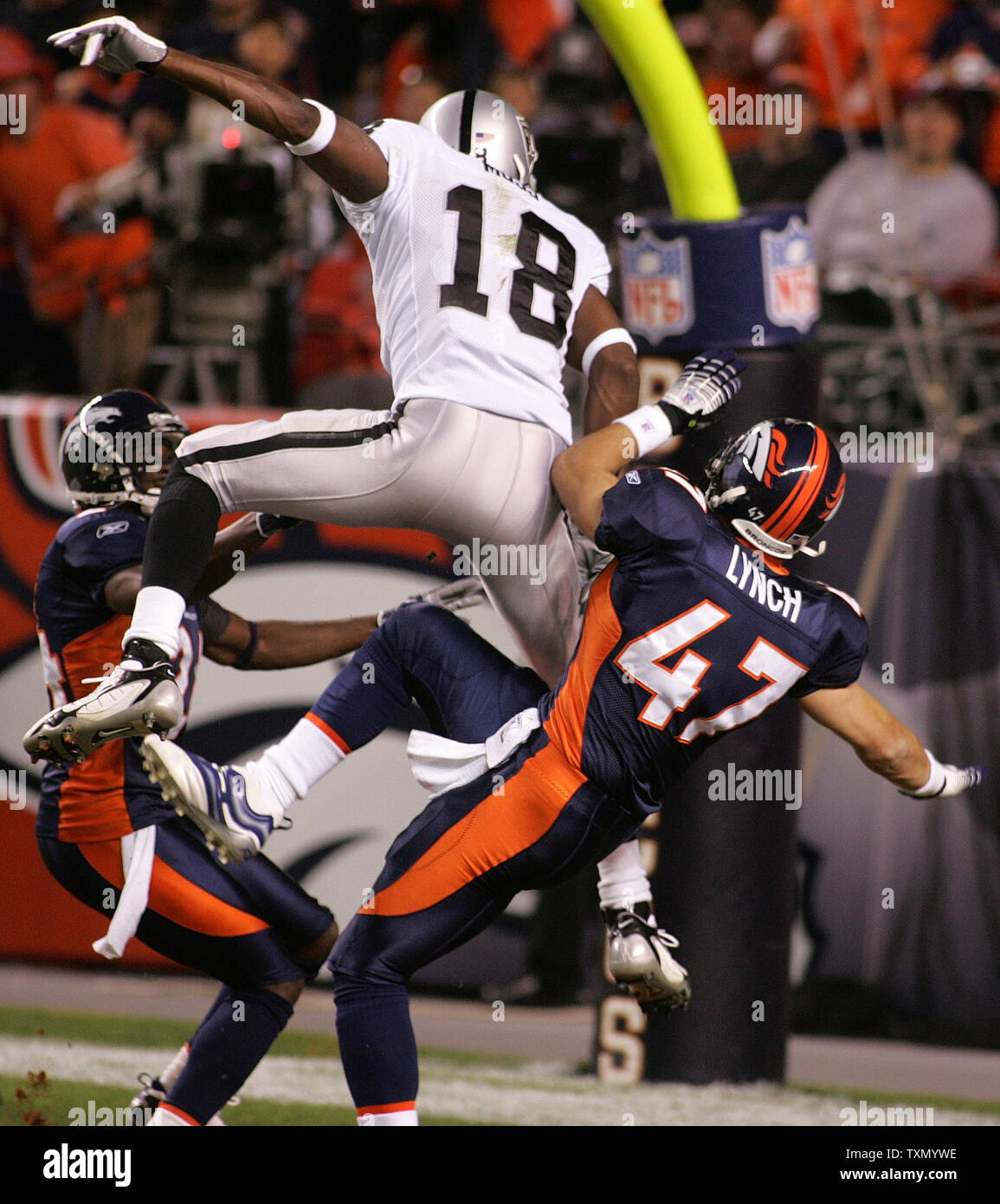 Raiders cornerback Brandon Facyson (35) tackles Chicago Bears wide receiver  Grat Jakeem (17) in …