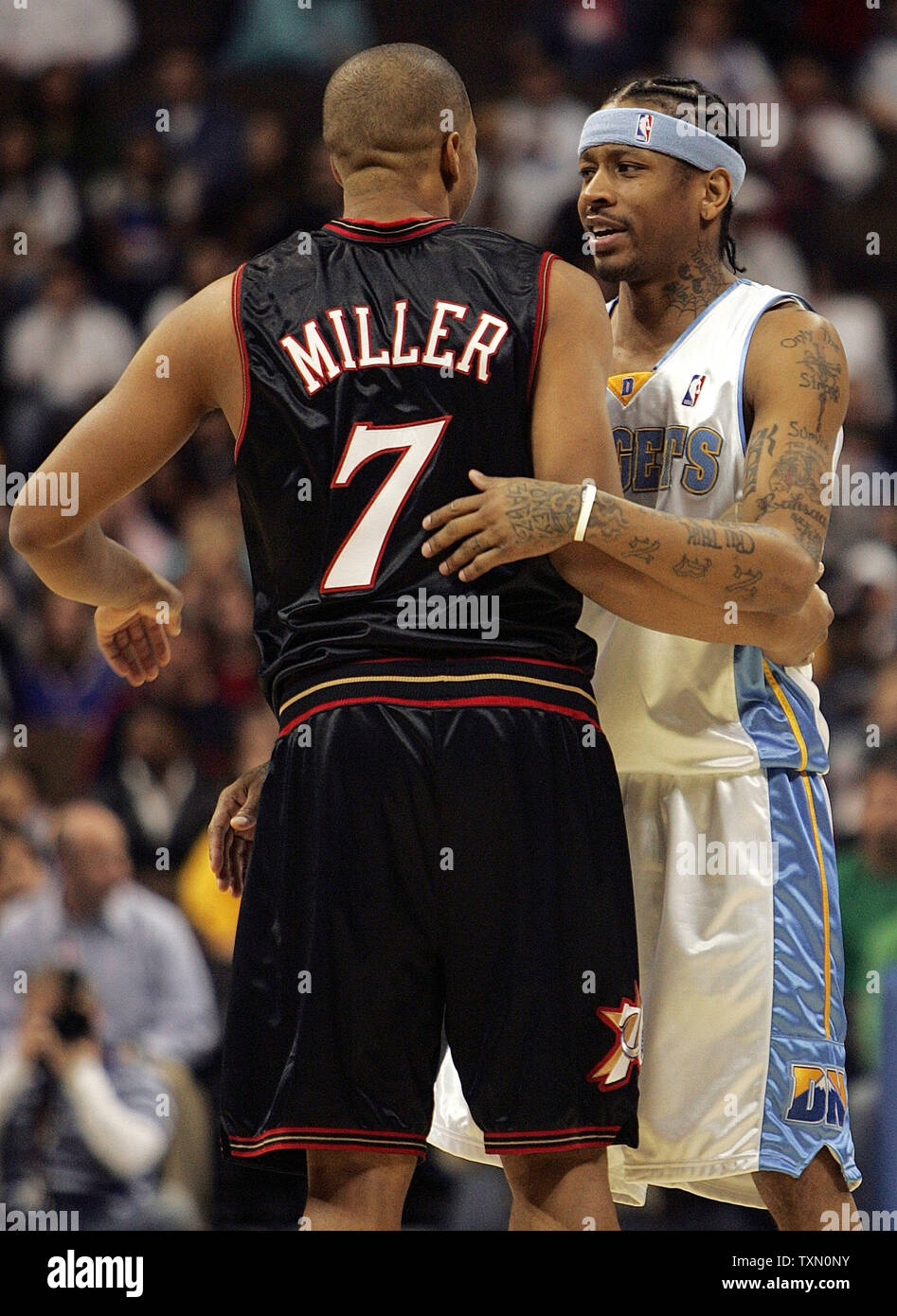 Denver Nuggets guard Allen Iverson (R) greets Philadelphia 76ers guard Andre Miller (L) prior to tipoff at the Pepsi Center in Denver January 2, 2007.  Iverson came to Denver in a trade involving Miller.  (UPI Photo/Gary C. Caskey) Stock Photo