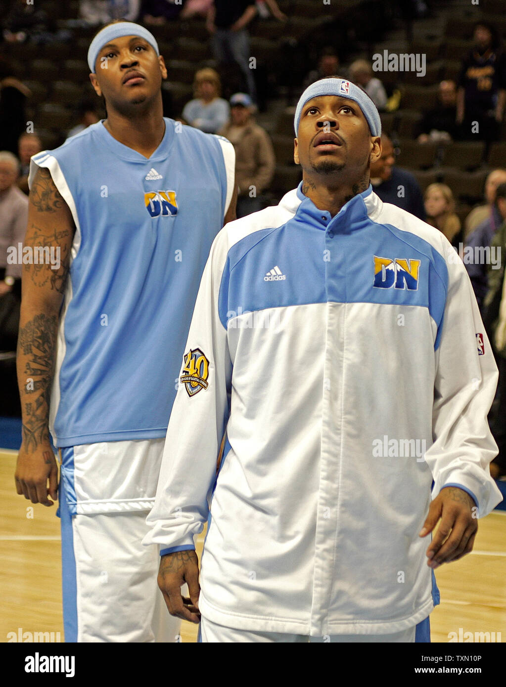 Denver Nuggets Carmelo Anthony (R) and Allen Iverson (L) sit on the bench  late in the fourth quarter as the Nuggets held a lead over the Memphis  Grizzlies at the Pepsi Center