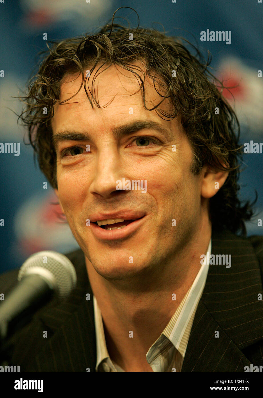 Colorado Avalanche captain Joe Sakic smiles after announcing his signing a new one-year deal to remain with the Colorado Avalanche during a press conference at the Pepsi Center in Denver April 9, 2007.   Sakic joins NHL former great Gordie Howe as the only players to reach the 100 point mark at the age of 37 or older.  Sakic finished the 2006-07 season with 36 goals and 64 assists.  (UPI Photo/Gary C. Caskey) Stock Photo