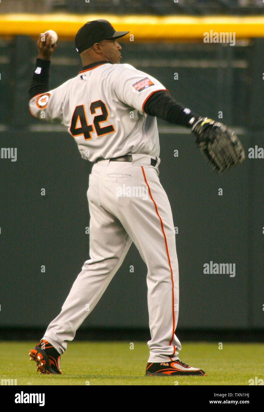 San Francisco Giants left fielder Barry Bonds warmups in the third inning against the Colorado Rockies at Coors Field in Denver April 16, 2007.  Bonds was wearing number 42 to honor baseball great Jackie Robinson as the Giants game in Pittsburgh was postponed on Sunday, the day that players were to wear Robinson's number.  (UPI Photo/Gary C. Caskey) Stock Photo