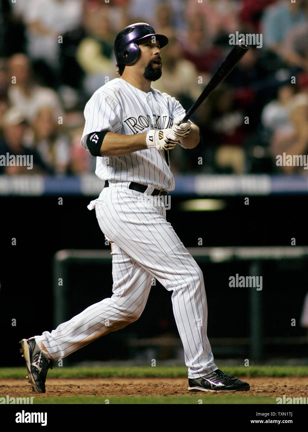 Colorado Rockies batter Todd Helton watches his sixth inning home run  against the San Francisco Giants at Coors Field in Denver on May 11, 2007.  Helton finished the game with a .397