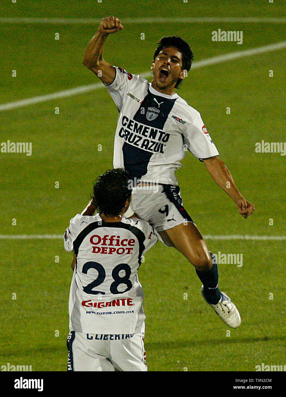 CF Pachuca forward Rafael Marquez Lugo (top) celebrates with his teammate Luis Montes after scoring in the second half against CD Guadalajara at Dick's Sporting Goods Park in Commerce City, Colorado on July 31, 2007. Pachuca defeated Guadalajara 1-0 to advance to the semifinals of the 2007 SuperLiga.   (UPI Photo/Gary C. Caskey) Stock Photo