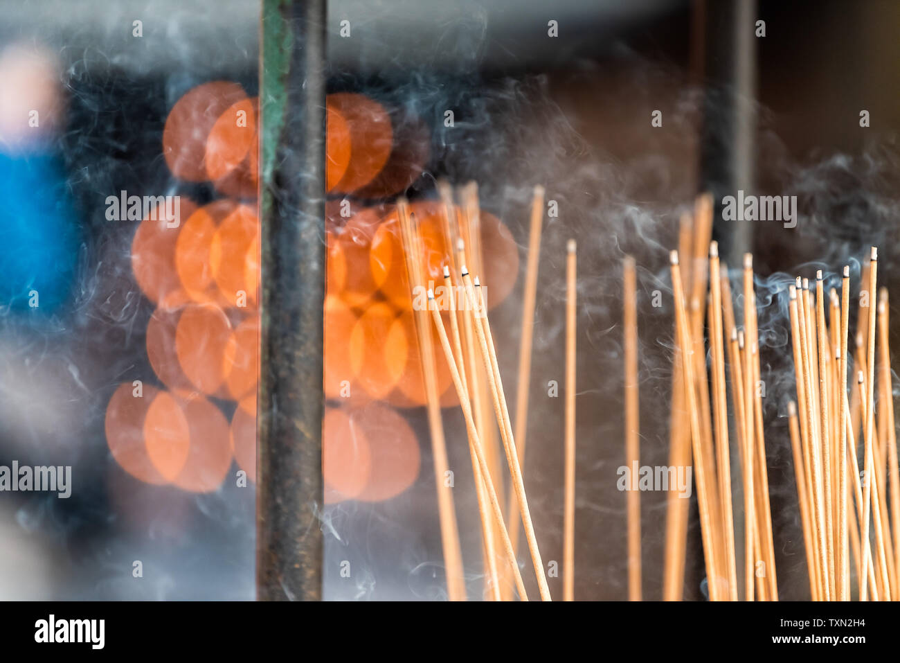 Kyoto, Japan temple shrine incense smoke burning flame sticks closeup