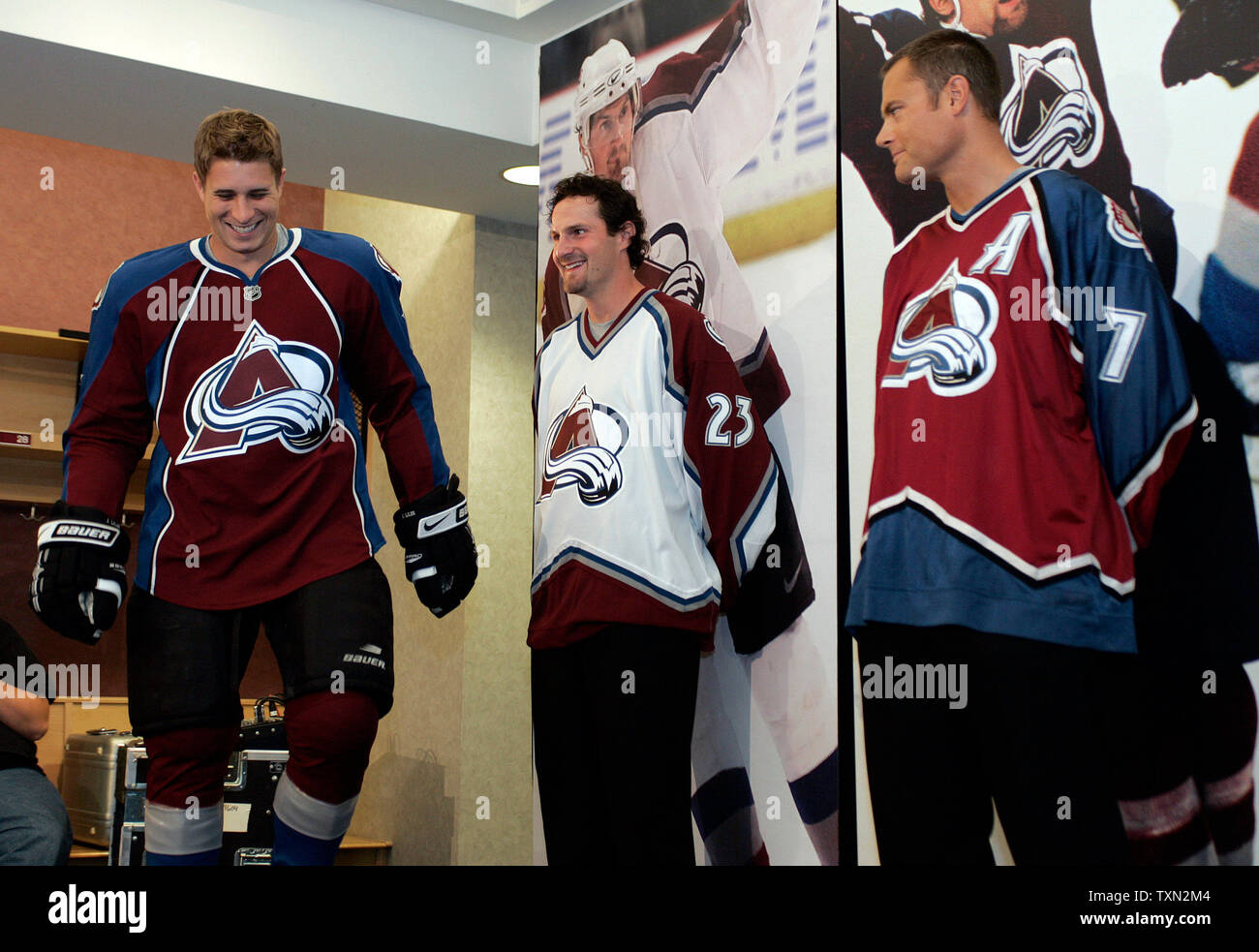 L-R) Colorado Avalanche players Milan Hejduk, John-Michael Liles, Curtis  Leschyshyn, and head coach Joel Quenneville model four generations of NHL Avalanche  jerseys at the Pepsi Center in Denver on September 12, 2007.