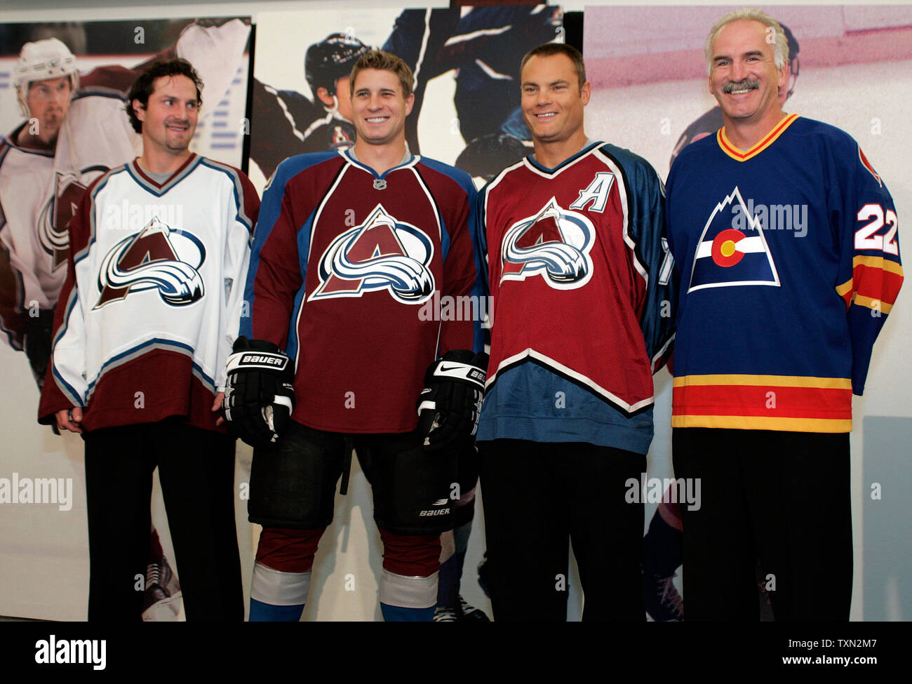 Colorado Avalanche head coach Joel Quenneville (R) wears his old Colorado  Rockies hockey jersey during press conference unveiling the NHL's and Colorado  Avalanche's newly designed Reebok Rbk EDGE uniforms at the Pepsi