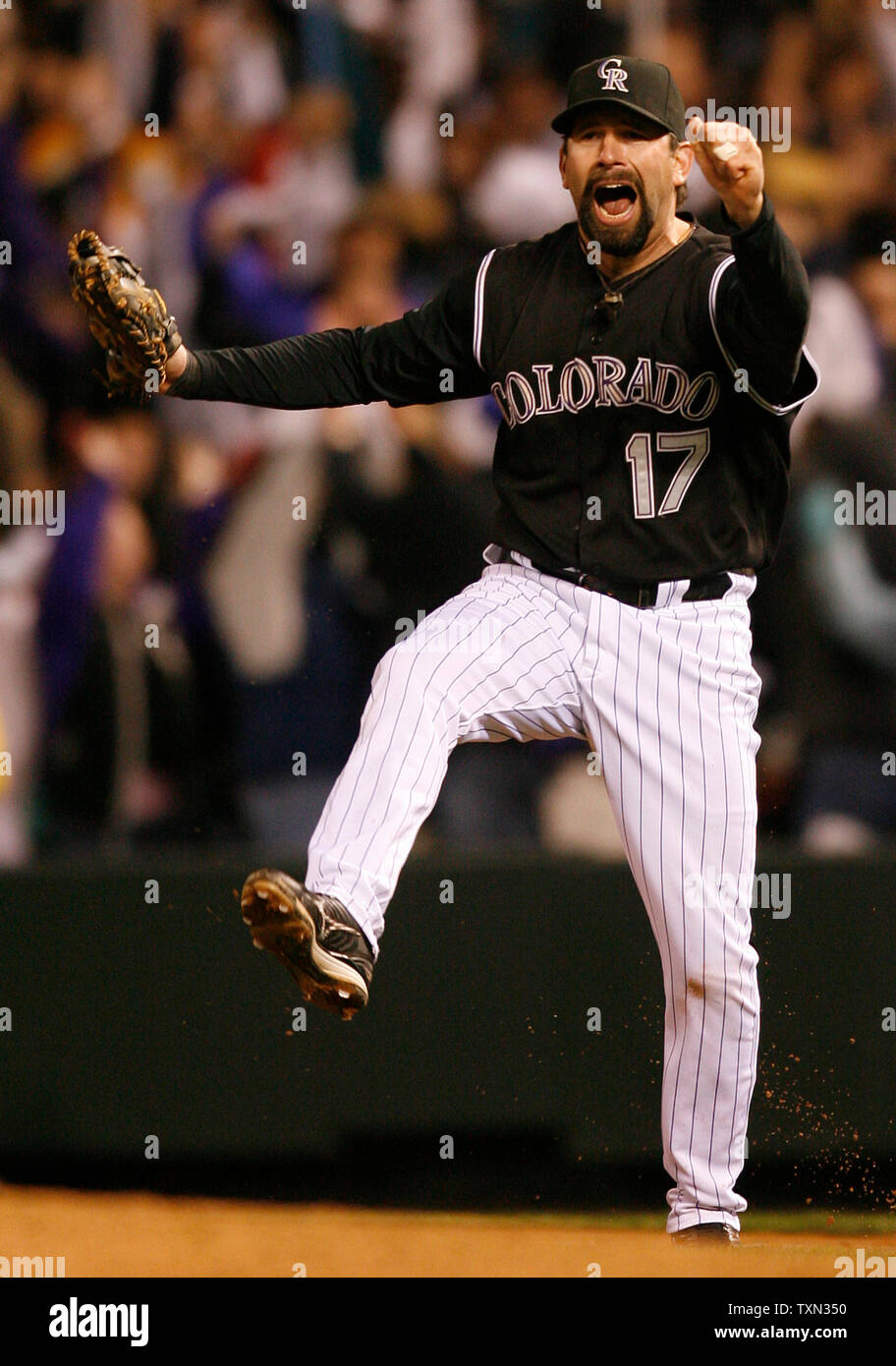 Colorado Rockies first baseman Todd Helton celebrates winning game four of  the National League Championship Series at Coors Field in Denver on October  15, 2007. Colorado won the National League championship defeating