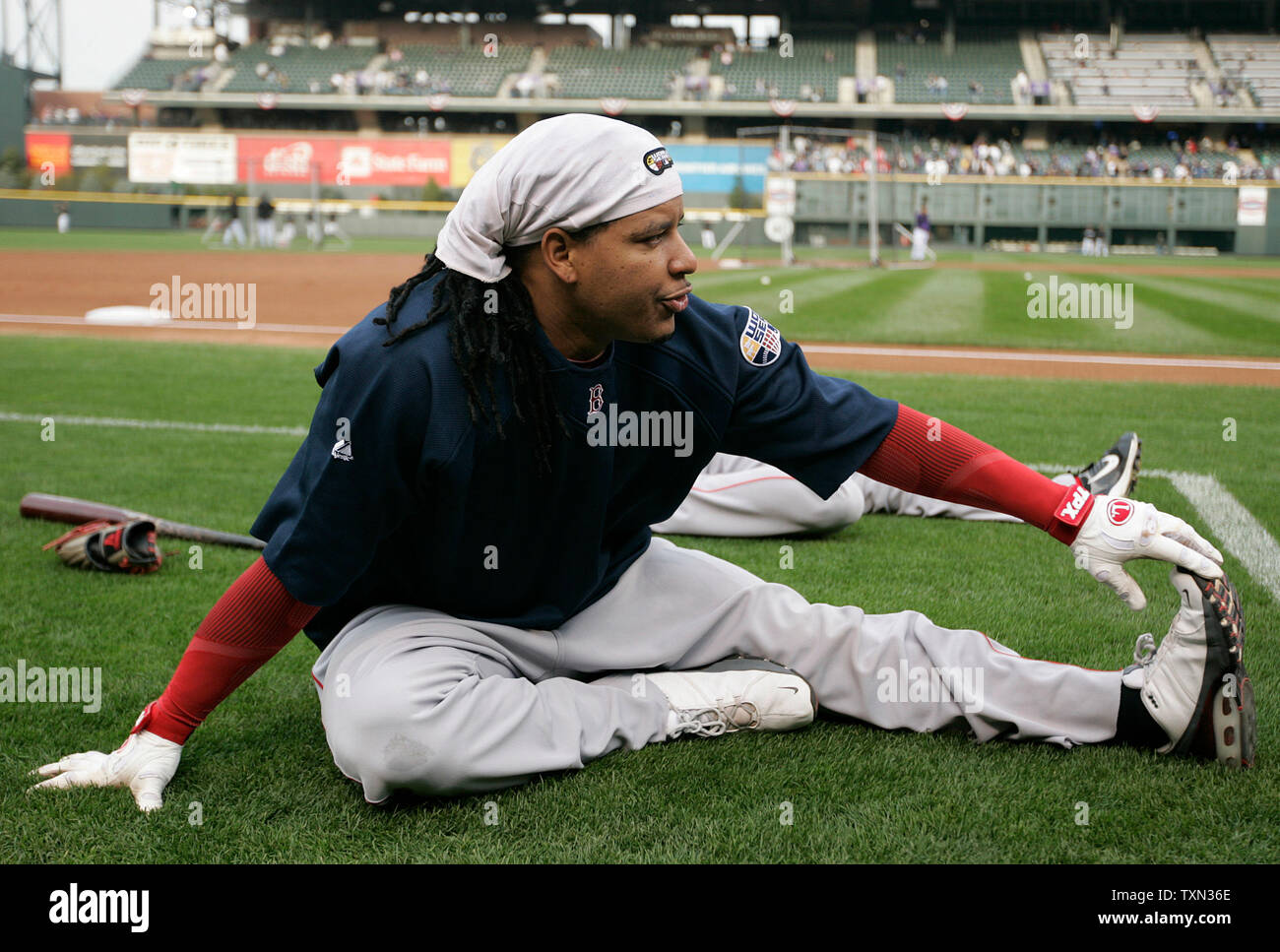 Boston Red Sox left fielder Manny Ramirez stretches before batting