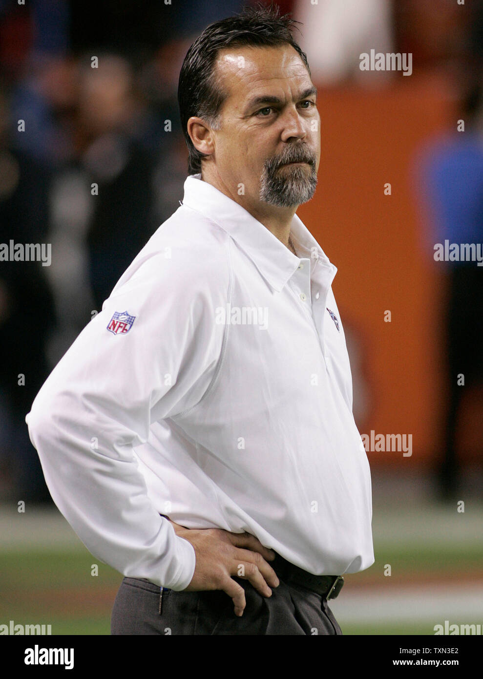 Tennessee Titans head coach Jeff Fisher waits for pre-game drills to begin at Invesco Field at Mile High in Denver on November 19, 2007.  (UPI Photo/Gary C. Caskey) Stock Photo