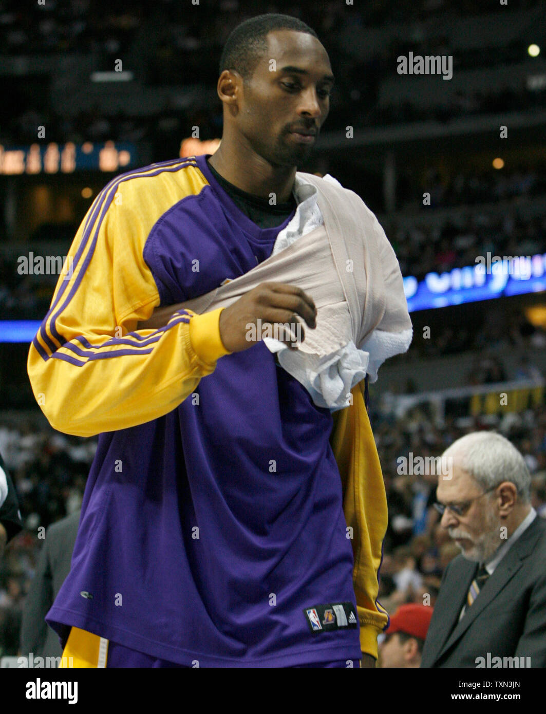 Los Angeles Lakers Guard Kobe Bryant Returns To The Bench With His
