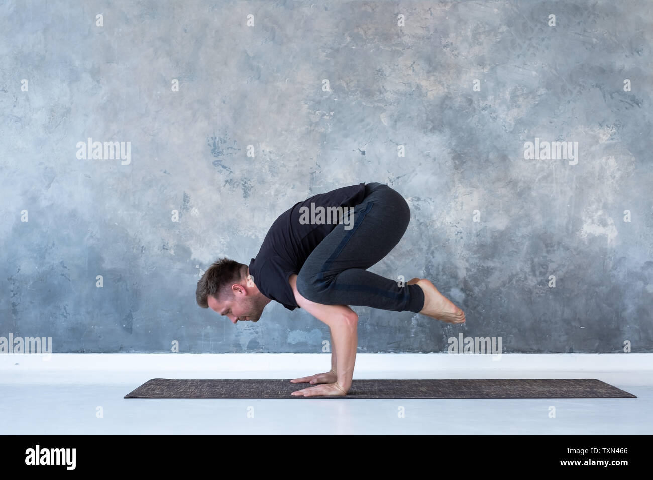 Sporty Young Man Working Out Doing Handstand Yoga Asana Crow Pose Or Bakasana Stock Photo Alamy Sporty Young Man Working Out Doing Handstand Yoga Asana Crow Pose Or Bakasana Stock Photo Alamy