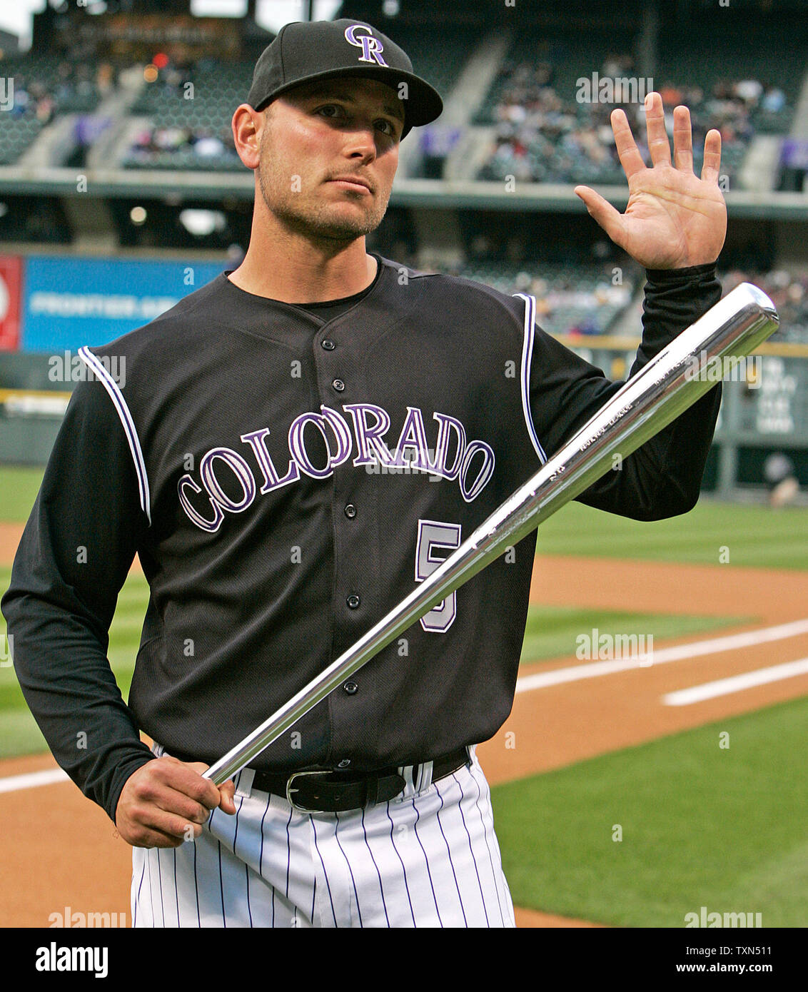Colorado Rockies Left Fielder Matt Holliday Waves To Fans Applauding After Receiving The National League Batting Title Trophy During A Pre Game Ceremony At Coors Field In Denver On April 7 2008 Upi