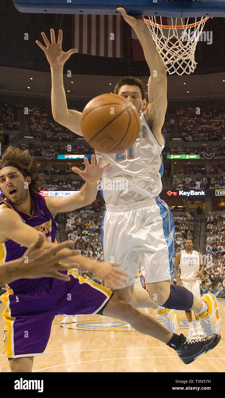 Denver Nuggets forward Eduardo Najera (R) stops Los Angeles Lakers guard Sasha Vujacic in the second half during the Western Conference quarterfinals game three at the Pepsi Center in Denver on April 26, 2008.  Los Angeles beat Denver 102-84 to take a 3-0 series lead.   (UPI Photo/Gary C. Caskey) Stock Photo