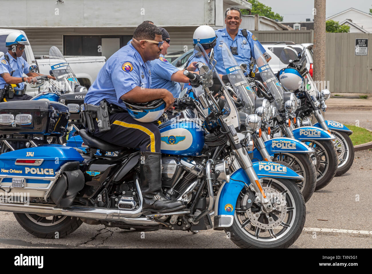 New Orleans, Louisiana - Motorcycle police prepare to direct traffic during a Second Line Parade. Stock Photo