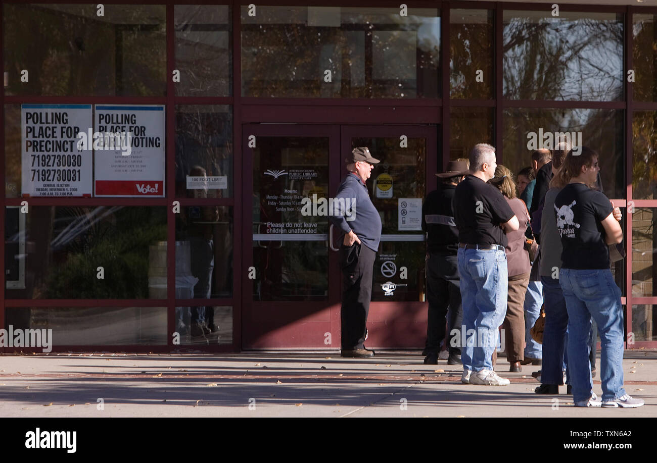 Voters Line Up Before The Doors Open For Early Voting At The