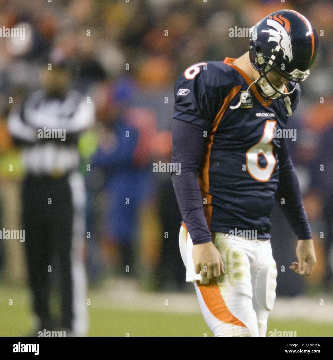 Denver Broncos rookie quarterback Jay Cutler (L) throws his first NFL  regular season pass against the Seattle Seahawks in the first quarter at  Invesco Field at Mile High in Denver December 3