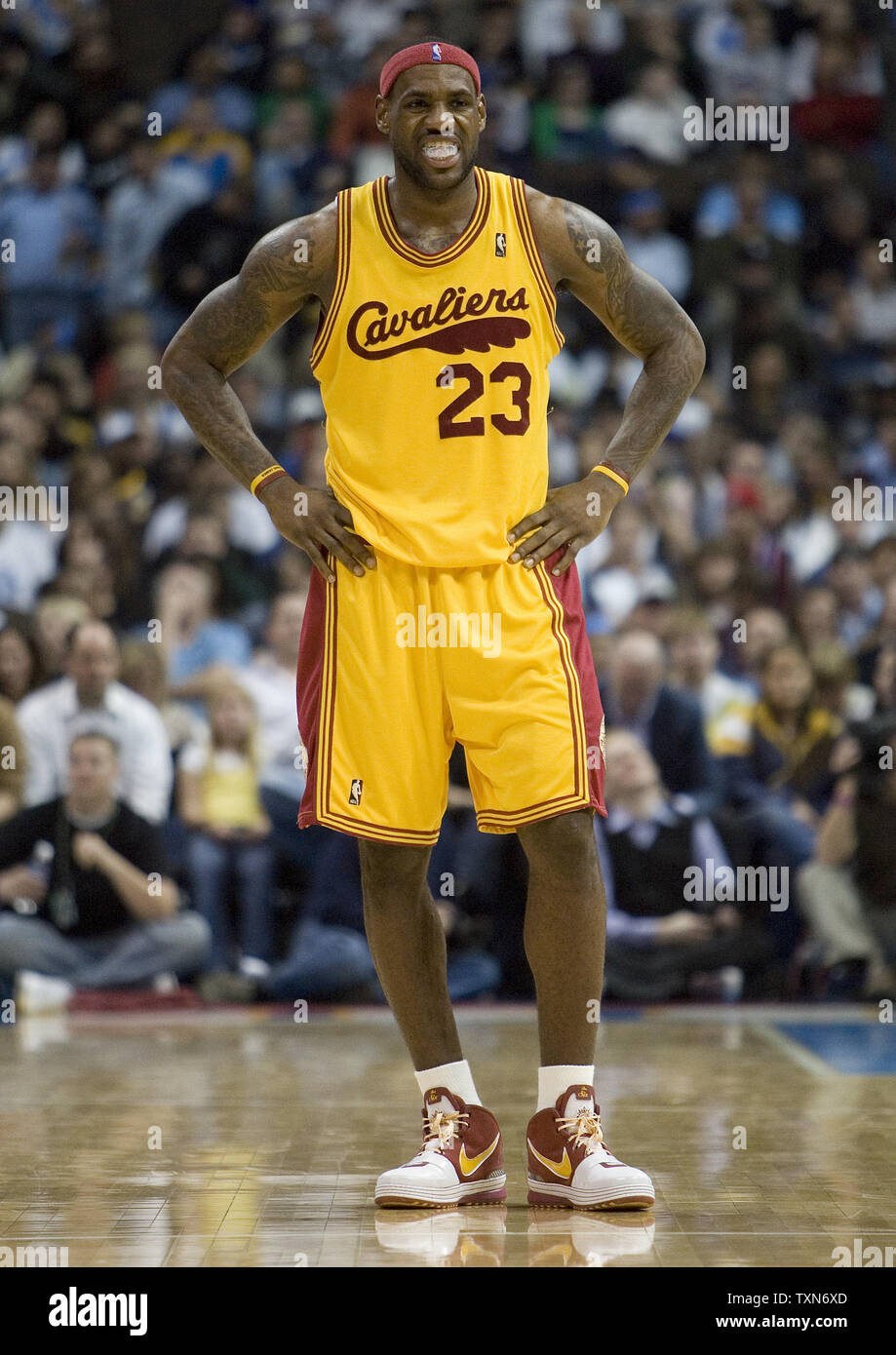 Cleveland Cavaliers forward LeBron James watches as teammate shoots a free  throw during the third quarter at the Pepsi Center in Denver on December  19, 2008. Cleveland blasted Denver 105-88 in a