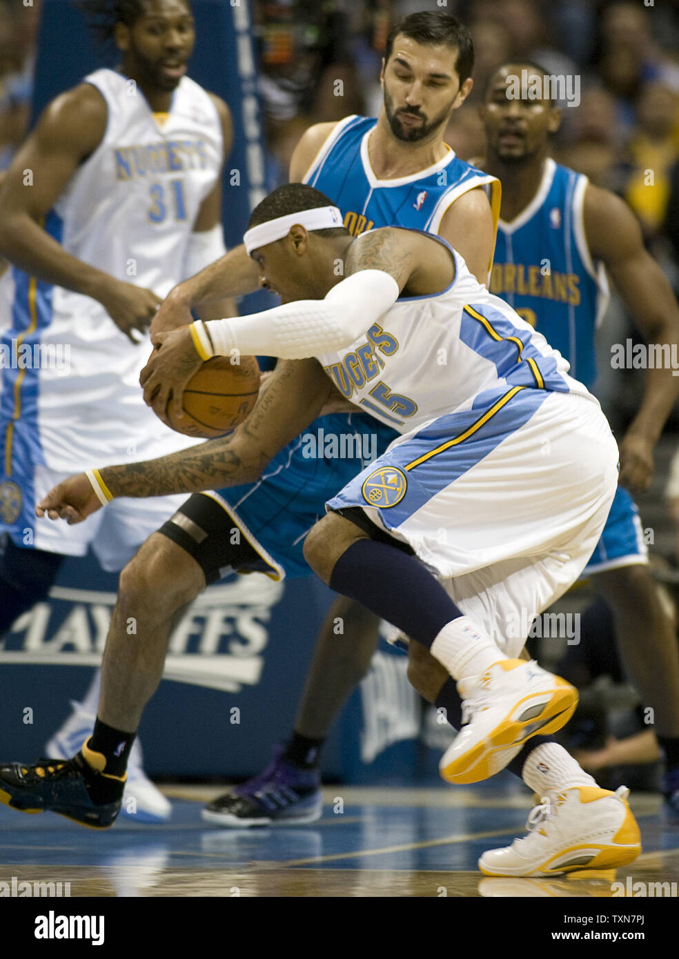New Orleans Hornets forward Peja Stojakovic, of Serbia, looks on against  the Denver Nuggets in the third quarter of the Nuggets' 116-110 overtime  win in an NBA basketball game in Denver on