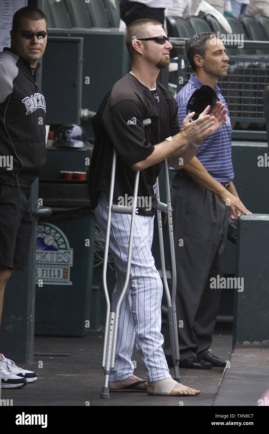 Colorado Rockies pitcher Alan Embree makes a brief dugout appearance before the start of the Rockies game against the Atlanta Braves at Coors Field in Denver on July 12. 2009. Embree suffered a broken lower right leg and had successful surgery on July 11, 2009.   Colorado beat Atlanta 8-7.    (UPI Photo/Gary C. Caskey) Stock Photo