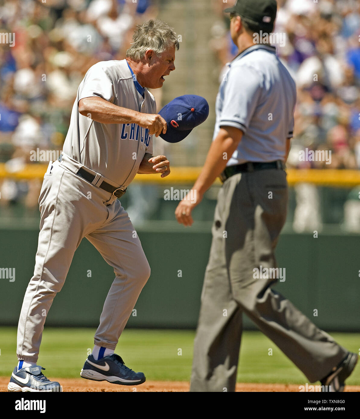 Chicago Cubs manager Lou Piniella reacts after umpire's call on a double  play that ended the Cubs second inning against the Colorado Rockies at  Coors Field in Denver on August 9, 2009.