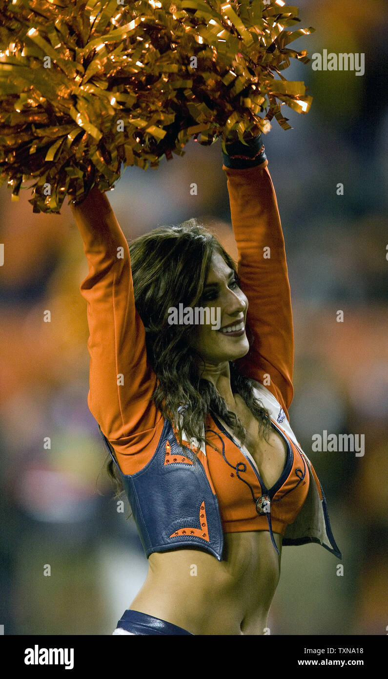 A Denver Broncos cheerleader performs during the second half at Invesco Field at Mile High in Denver on November 26, 2009.  Denver (7-4) defeated New York 26-6..              UPI/Gary C. Caskey... Stock Photo