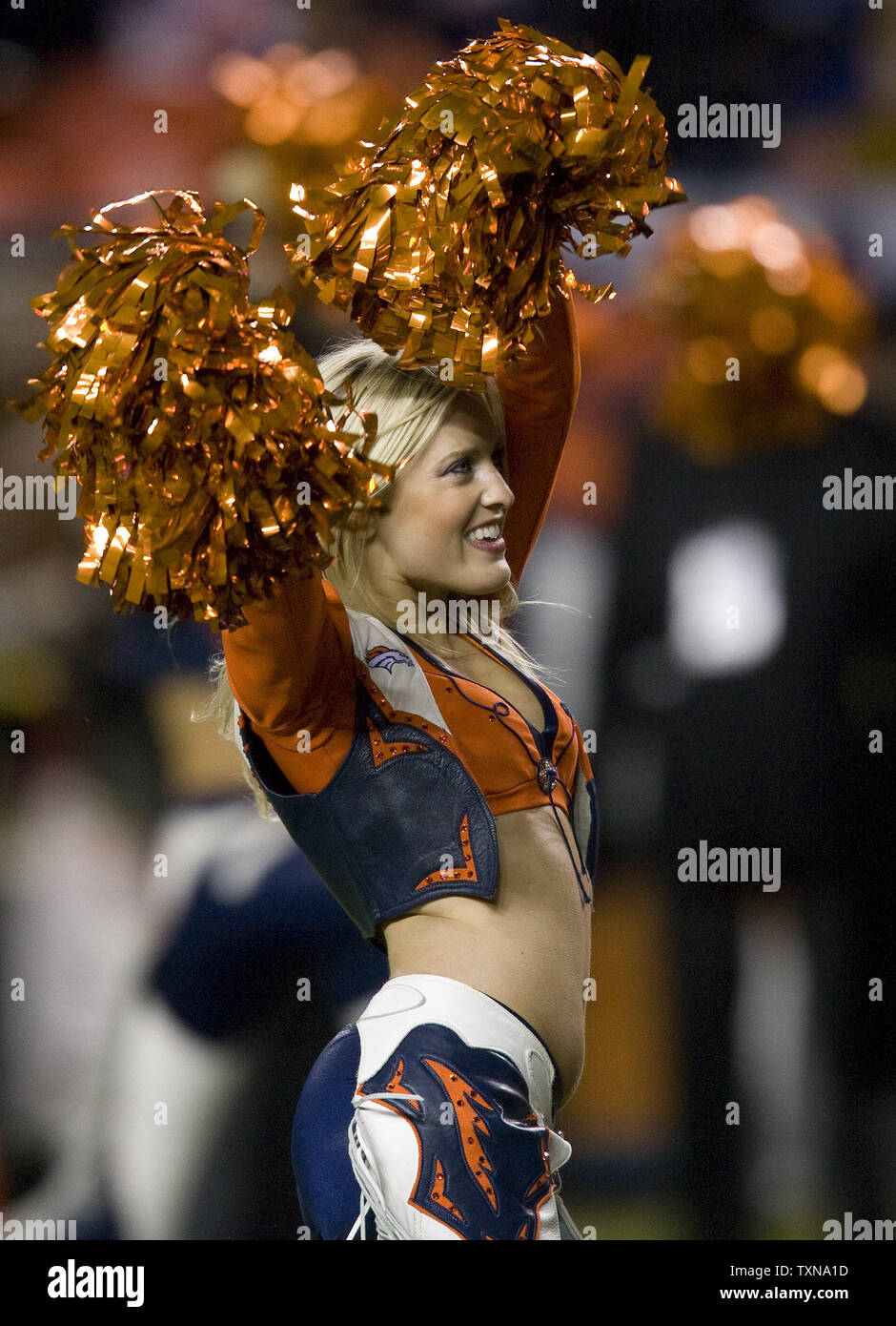 A Denver Broncos cheerleader performs during the second half at Invesco Field at Mile High in Denver on November 26, 2009.  Denver (7-4) defeated New York 26-6.      UPI/Gary C. Caskey.           ... Stock Photo