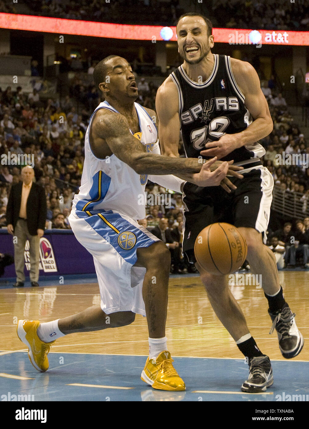 San Antonio Spurs forward Manu Ginobili brings the ball upcourt against the  Denver Nuggets at Pepsi Center in Denver, Colorado December 31, 2005. (UPI  Photo/Gary C. Caskey Stock Photo - Alamy