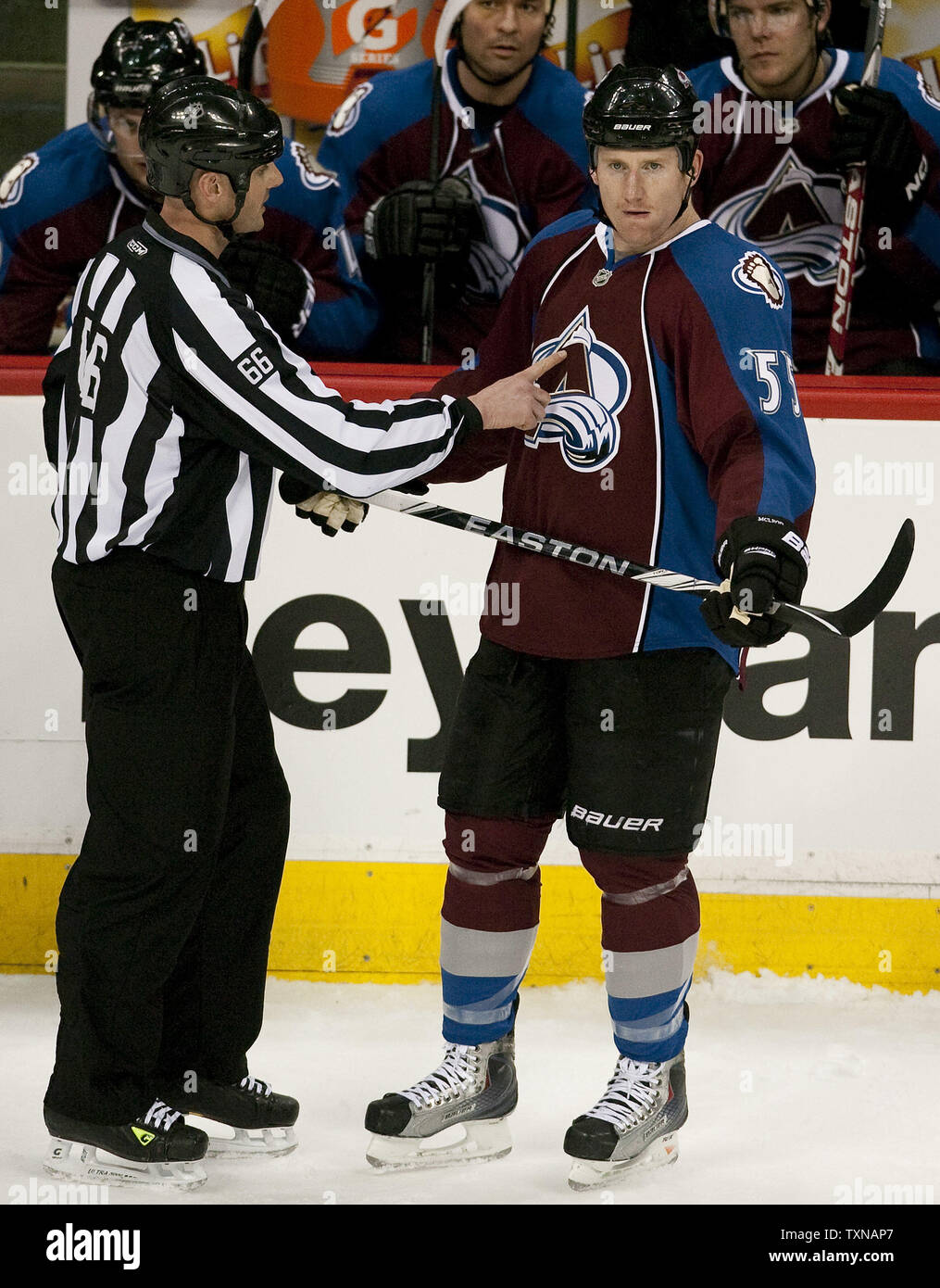 Linesman Darren Gibbs (66) informs Colorado Avalanche Cody McLeod (R) that his goal in the first period against the Anaheim Ducks did not count as he made contact with the puck above the height of the net during the first period  at the Pepsi Center on March 31, 2010 in Denver.   Colorado holds the final Western Conference playoff spot with 89 points four ahead of the Calgary Flames.  UPI/Gary C. Caskey Stock Photo