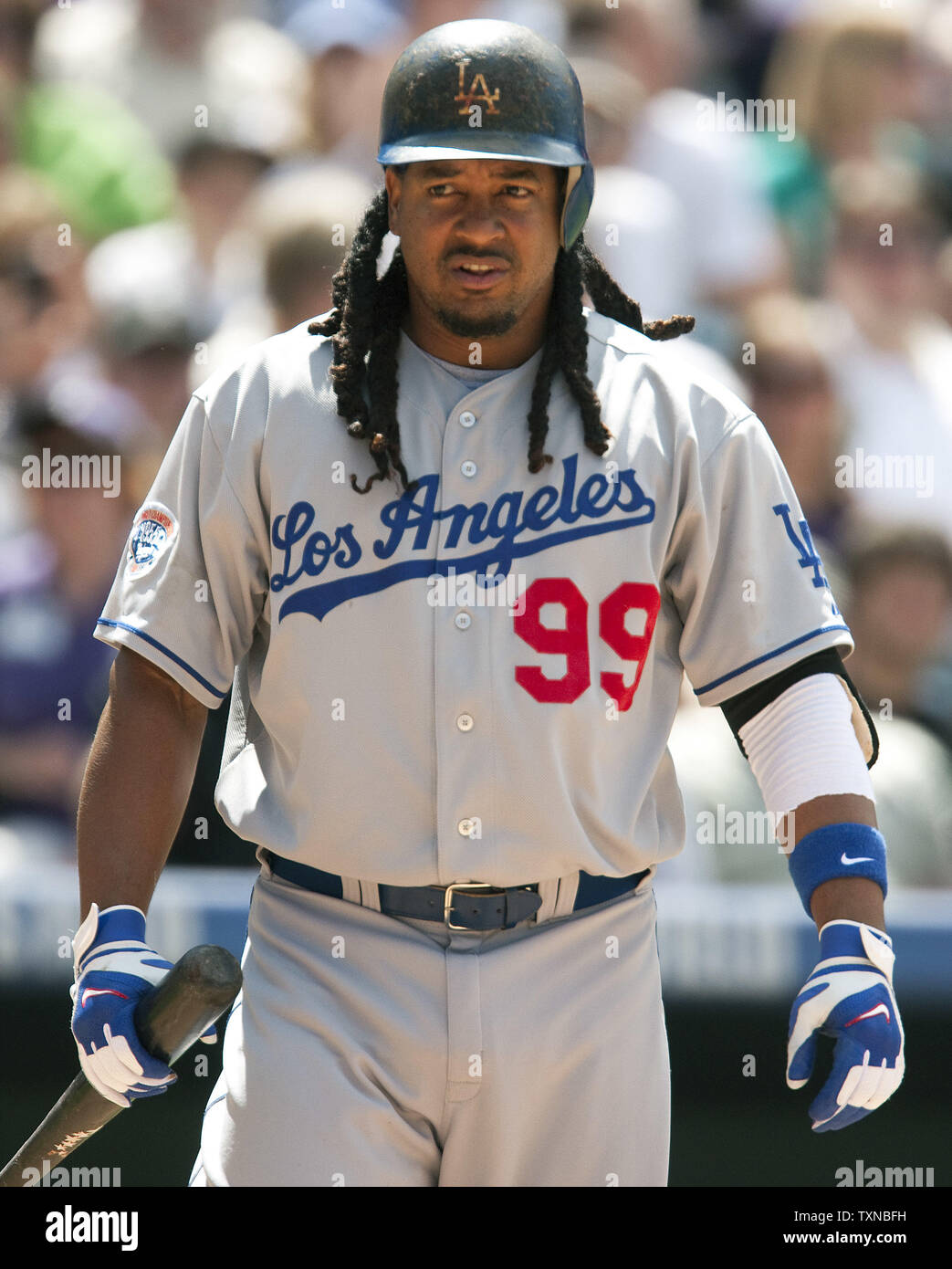 Los Angeles Dodgers left fielder Manny Ramirez walks to the plate as a  pinch hitter during the sixth inning against the Colorado Rockies on his  38th birthday at Coors Field on May