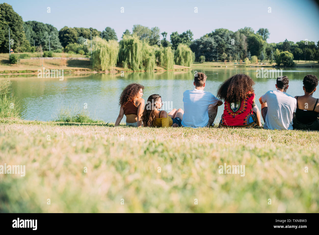 Friends in lake view hi-res stock photography and images - Alamy