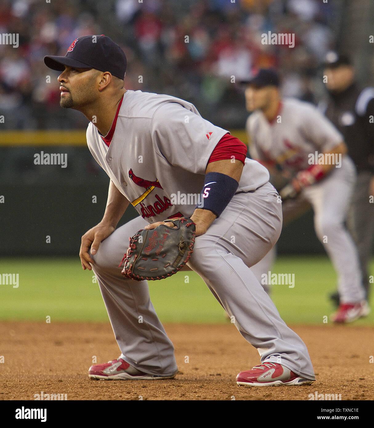 St. Louis Cardinals All-Star first baseman Albert Pujols takes his  defensive stance against the Colorado Rockies at Coors Field on July 7, 2010  in Denver. Colorado beat St. Louis 8-7. UPI/Gary C.