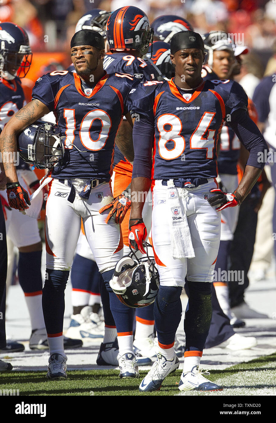 Denver Broncos wide receivers jabar Gaffney (10) and Brandon Lloyd watch play against the Seattle Seahawks during the second half at Invesco Field at Mile High on September 19, 2010 in Denver.           .  UPI/Gary C. Caskey Stock Photo
