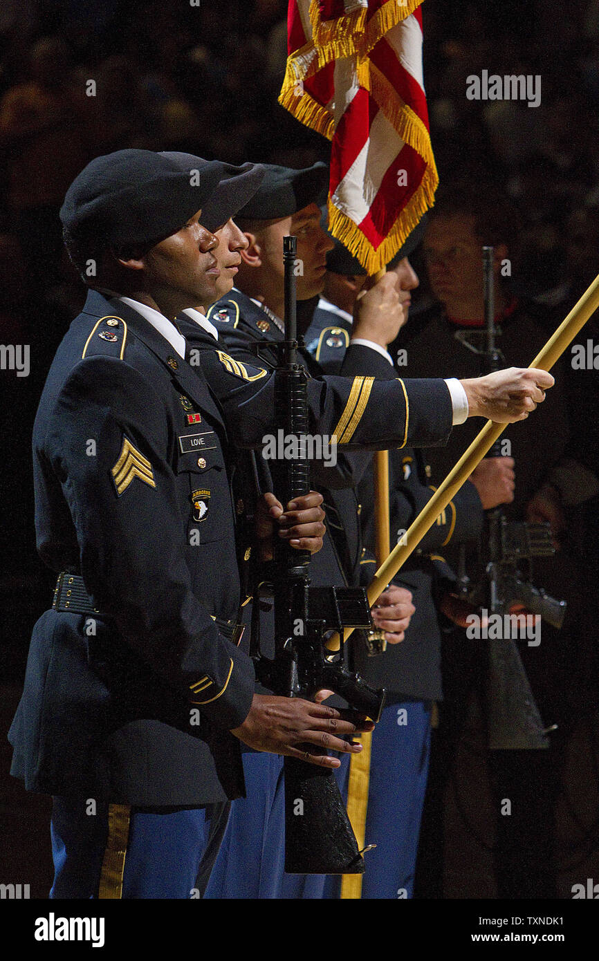 The U.S.Army Honor Guard from Colorado Springs take part in the playing of the national anthem on Veterans Day as the Denver Nuggets host the Los Angeles Lakers at the Pepsi Center in Denver on November 11, 2010.  The Lakers look to remain undefeated.       UPI/Gary C. Caskey Stock Photo