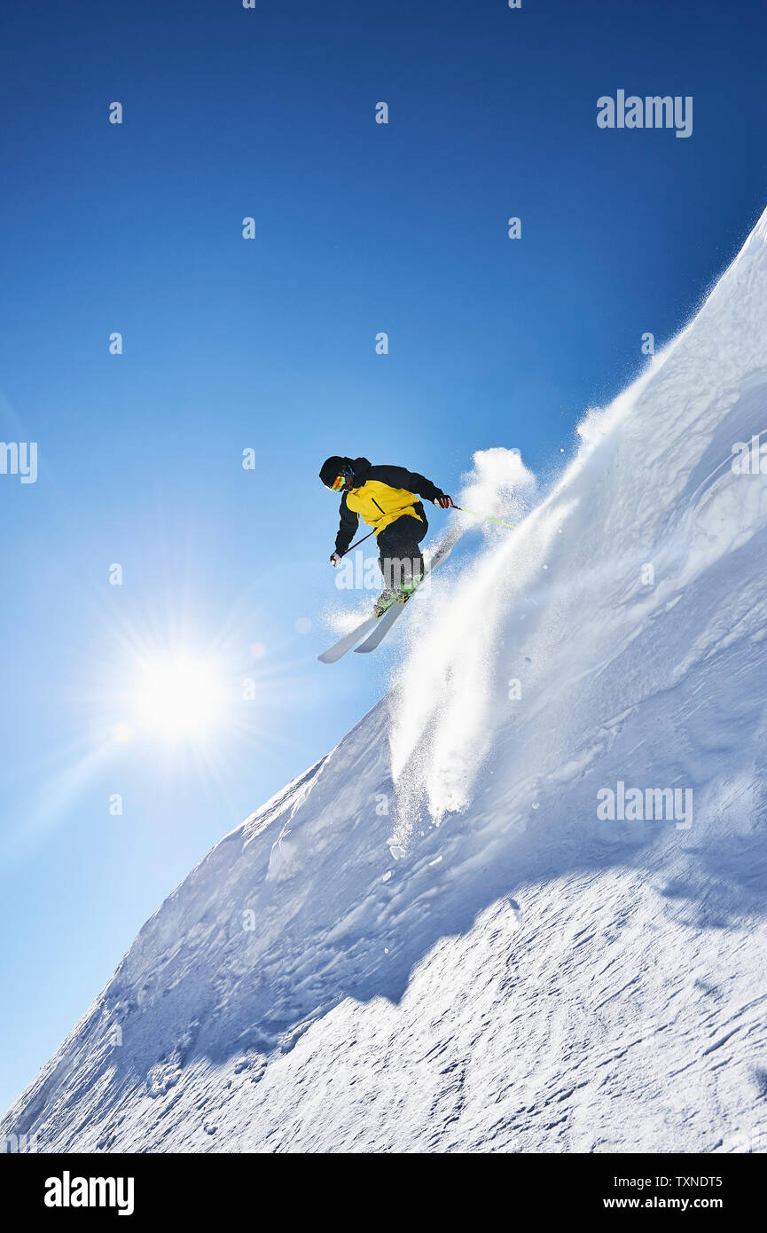 Skier moving down slopes, Saas-Fee, Valais, Switzerland Stock Photo