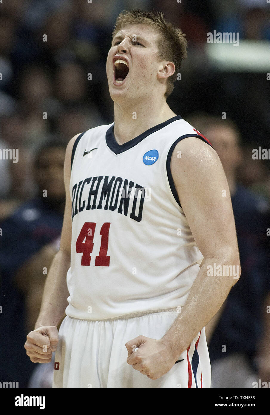 Richmond Spiders center Dan Geriot celebrates his three-point shot against  the Morehead State Eagles during the second half of the NCAA Southwest  third round regional at the Pepsi Center in Denver on