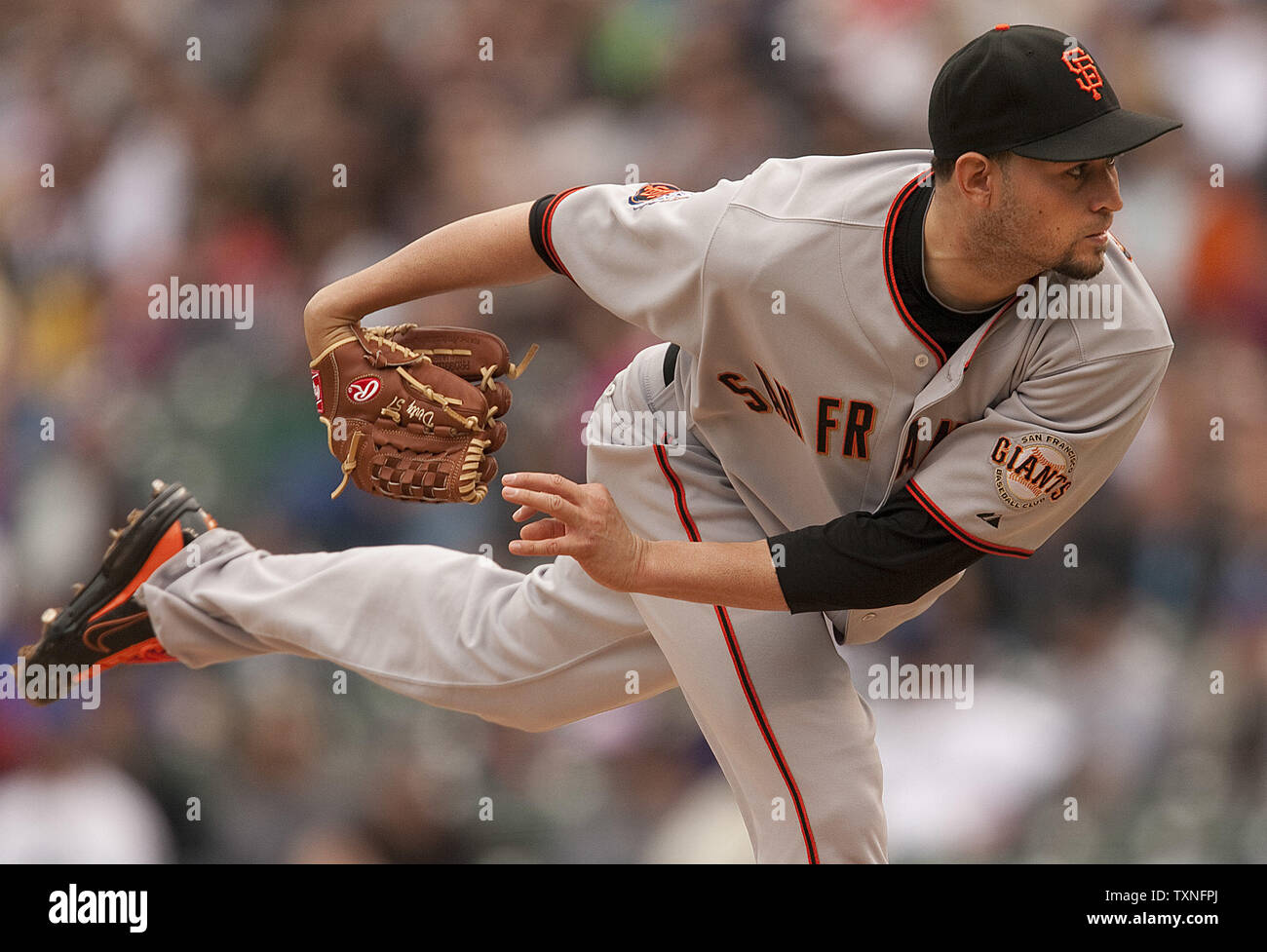 Giants starting pitcher Jonathan Sanchez is joined by catcher Buster Posey  and Pablo Sandoval in the second inning with the bases loaded at AT&T Park  on Tuesday. (Michael Macor/San Francisco Chronicle via