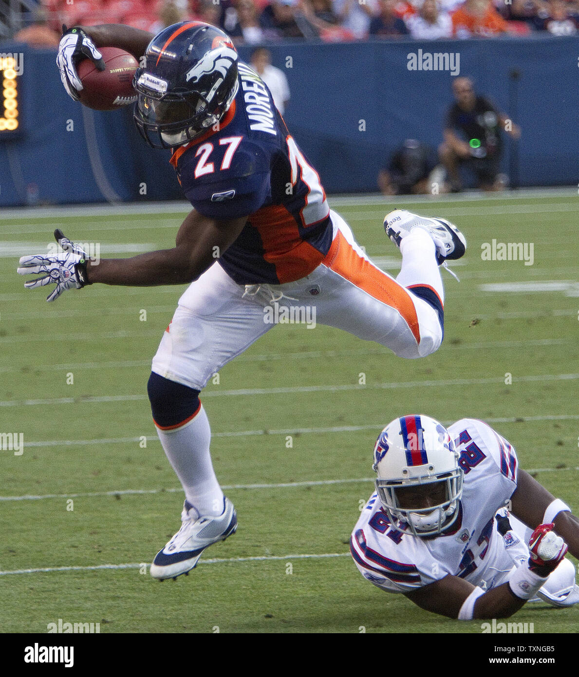 Buffalo Bills cornerback Leodis McKelvin (R) knocks Denver Broncos running back Knowshon Moreno (27) out of bounds during the first half at Sports Authority Field at Mile High in Denver on August 20, 2011.    UPI/Gary C. Caskey Stock Photo