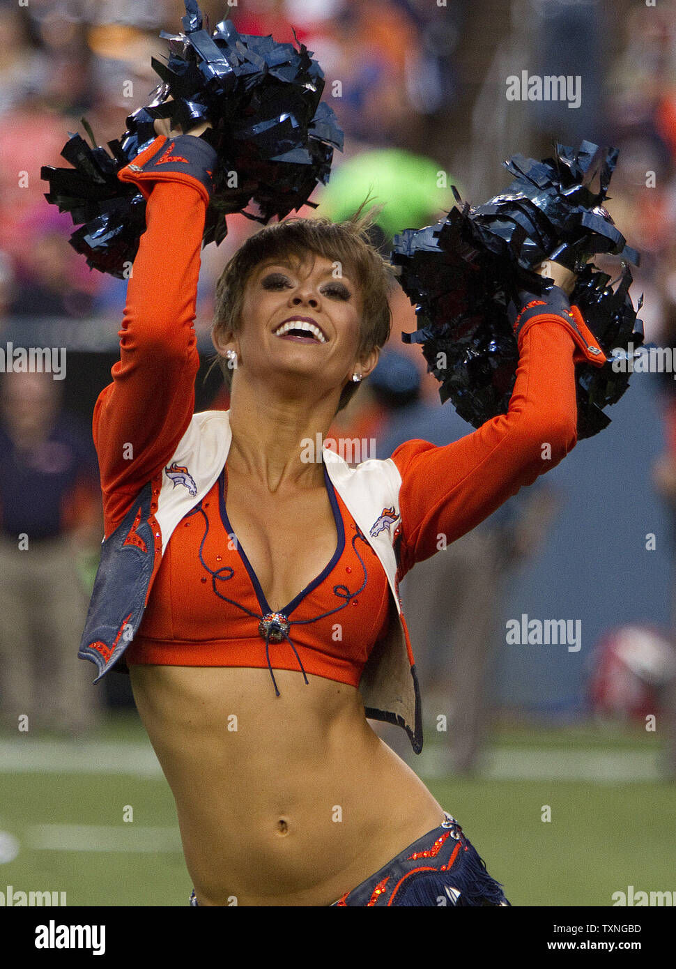 A Denver Broncos cheerleader performs at Sports Authority Field at Mile  High in Denver on August 20, 2011. UPI/Gary C. Caskey Stock Photo - Alamy