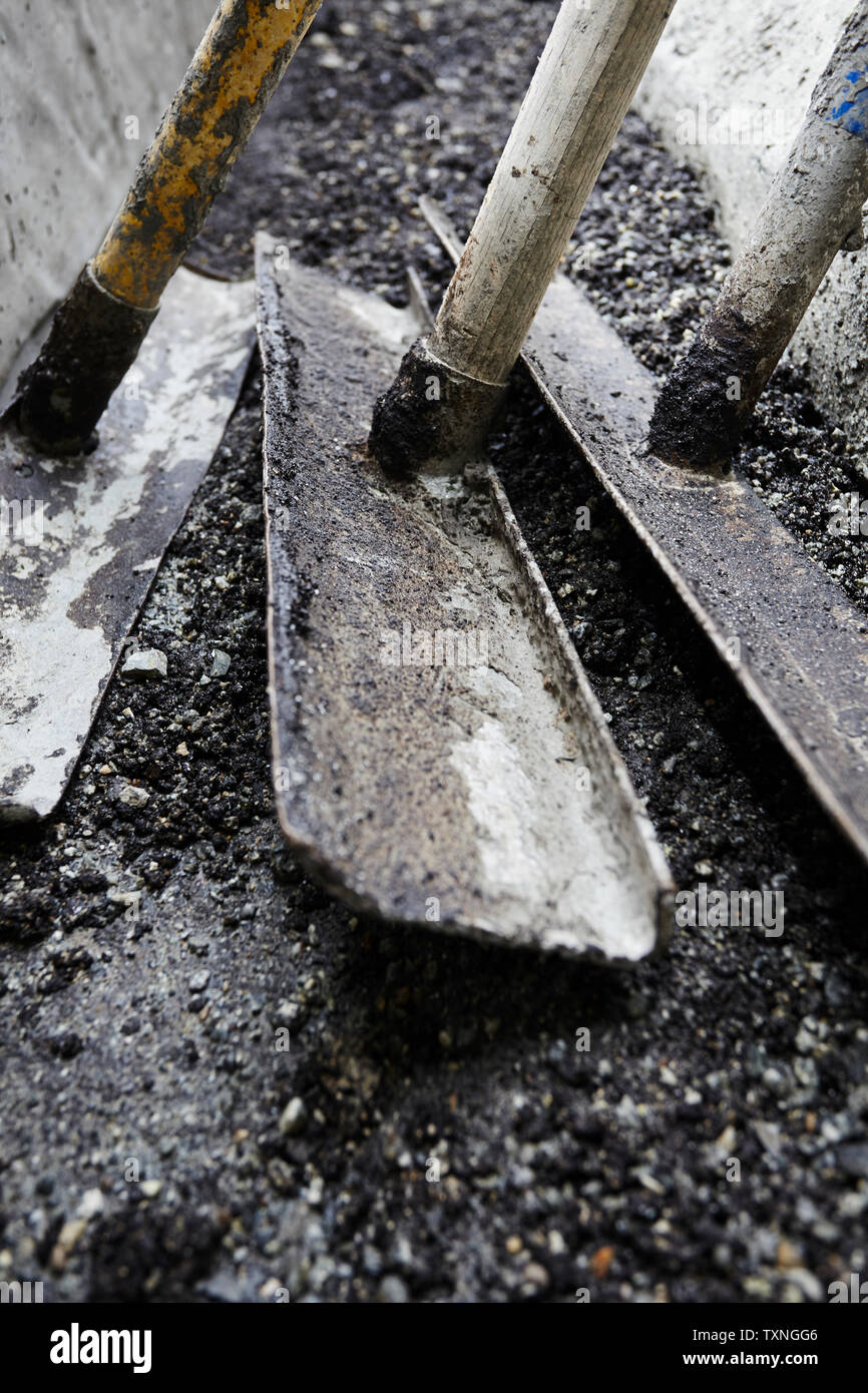 Asphalt lutes on highway construction site, close up detail Stock Photo