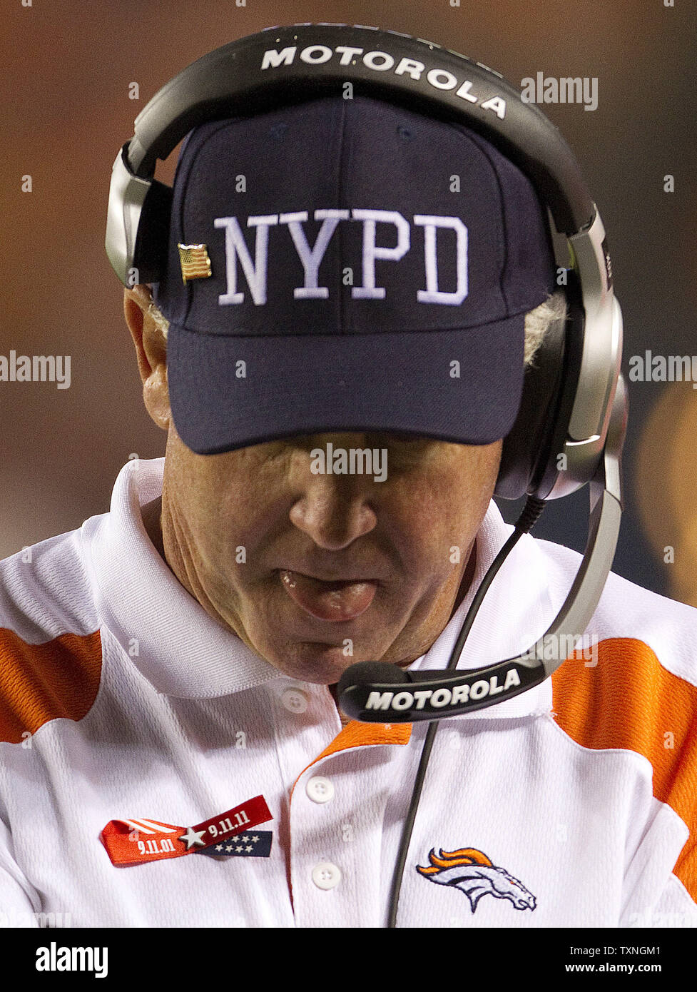 Denver Broncos head coach John Fox loses his first regular season game with the Broncos against the arch rival Oakland Raiders at Sports Authority Field at Mile High on September 12, 2011 in Denver.   Fox wore a New York police department to honor the tenth anniversary of the 9-11 attacks.    Denver lost 23-20 to Oakland.     UPI/Gary C. Caskey Stock Photo