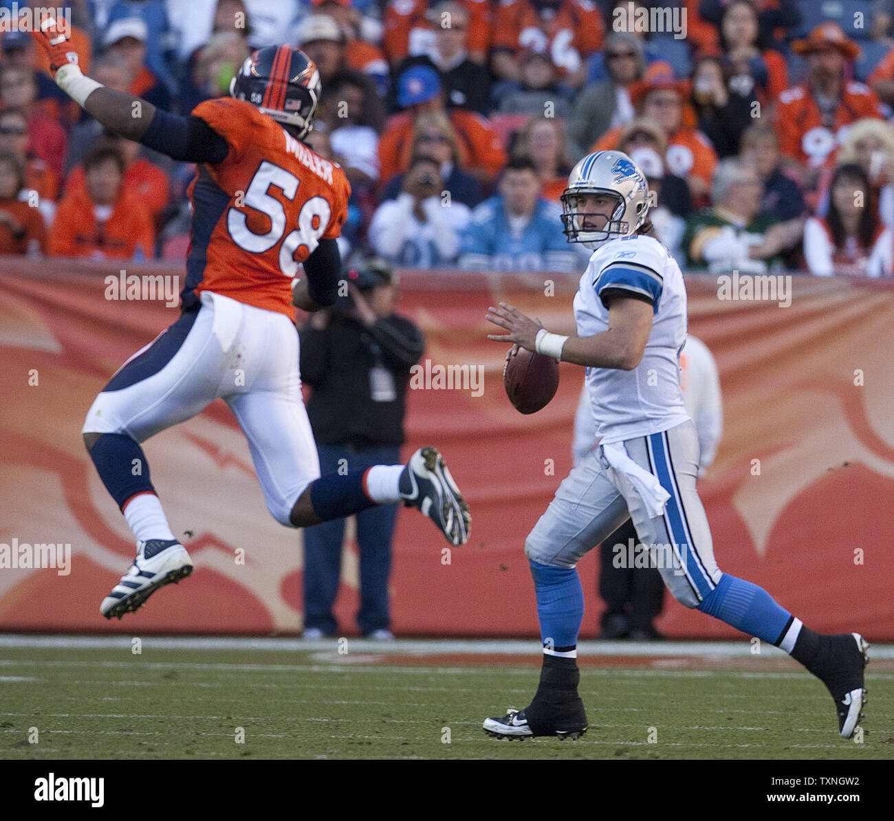 Denver Broncos linebacker Von Miller leaps to pressure Detroit Lions  quarterback Matthew Stafford in the second half at Sports Authority Field  at Mile High in Denver on October 30, 2011. Detroit crushed