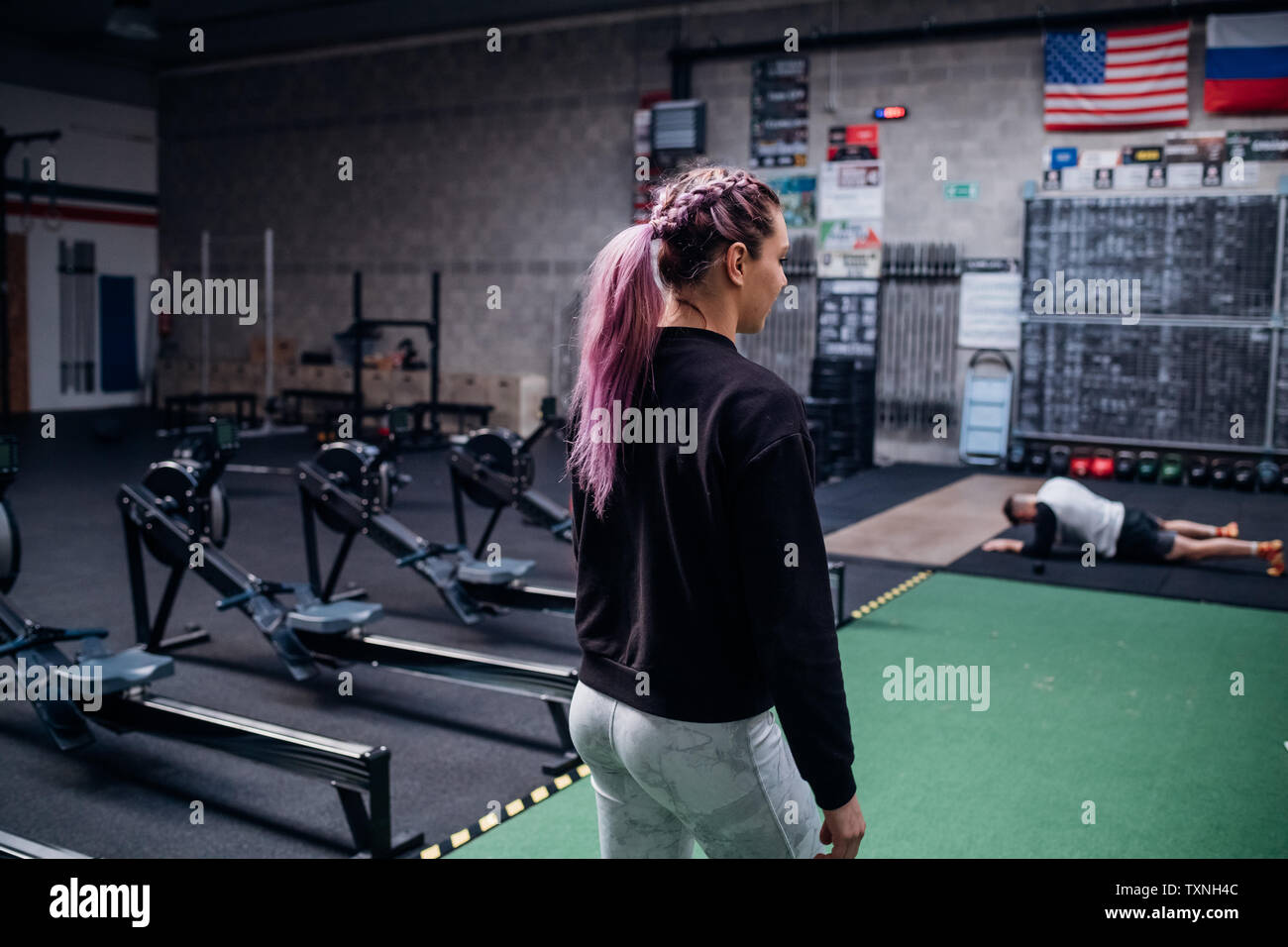 Young couple working out in gym Stock Photo