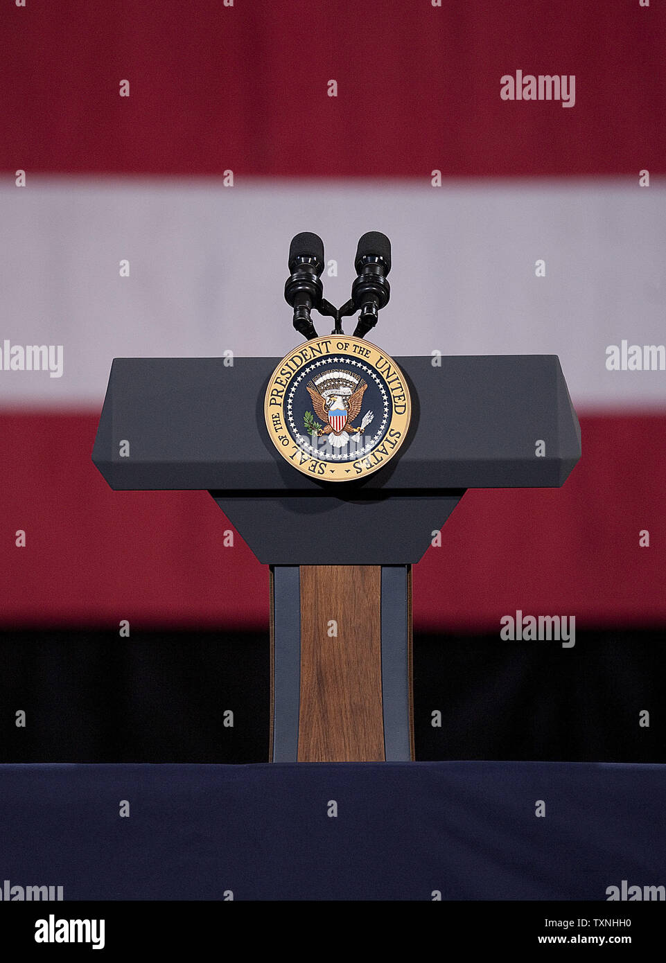 The Presidential Seal adorns the podium moments before President Barack Obama speaks at Buckley Air Force Base on January 26, 2012 in Aurora, Colorado.  President Obama is using his western trip to promote the broad ideas contained in his State of the Union Address to create jobs, improve education and teachers, and create incentives for renewable energy.  Colorado is a swing state critical to President Obama's re-election in November.     UPI/Gary C. Caskey Stock Photo