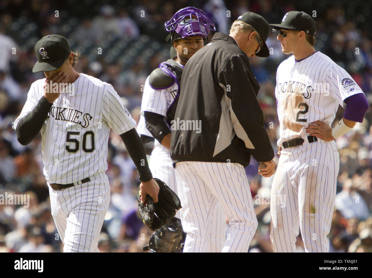 49 year old Colorado Rockies starting pitcher Jamie Moyer (50) leaves the field after being relieved in the sixth inning against the San Francisco Giants at Coors Field on April 12, 2012 in Denver.  Moyer is the second oldest person behind the great Satchel Paige but failed to earn the win in his second outing of the season.     UPI/Gary C. Caskey Stock Photo
