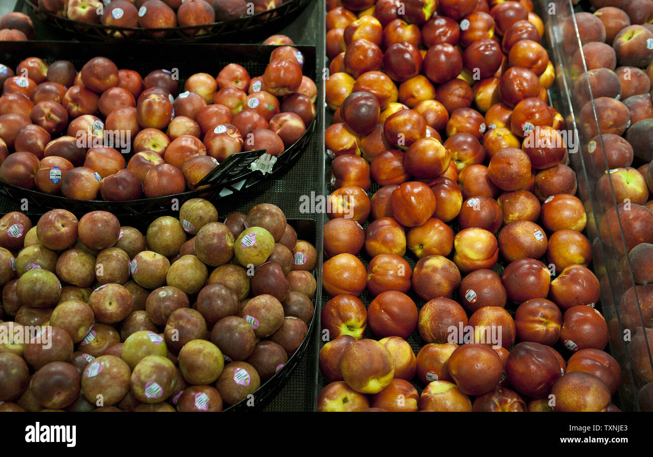 Fruits including peaches stand on display at the King Soopers
