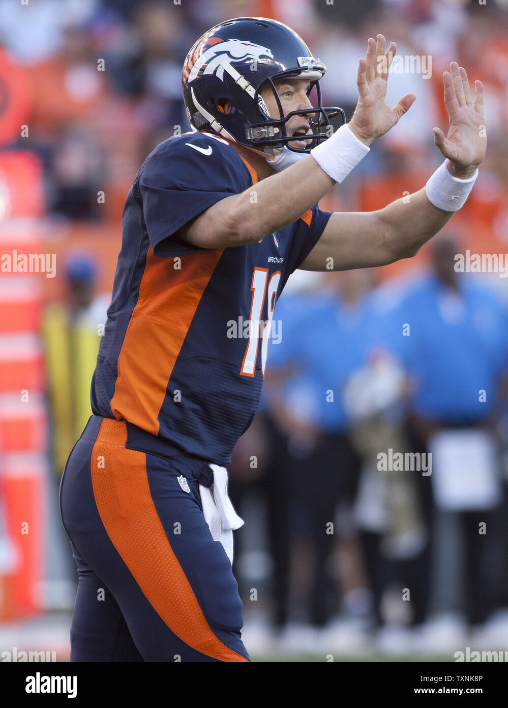 Denver Broncos quarterback Peyton Manning signals a new play against the Chargers at Sports Authority Field at Mile High on November 18, 2012 in Denver.   Manning led the Broncos to a 30-23 win over the San Diego Chargers.     UPI/Gary C. Caskey Stock Photo